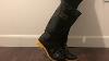 New Pair Of Shiny Black Rubber Boots With Yellow Soles