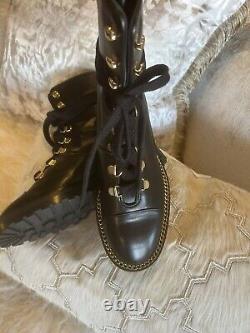 Stuart Weitzman Kolby Combat Boots Black Leather W Gold Chain Hardware 4.5 Eu 35