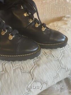 Stuart Weitzman Kolby Combat Boots Black Leather W Gold Chain Hardware 4.5 Eu 35